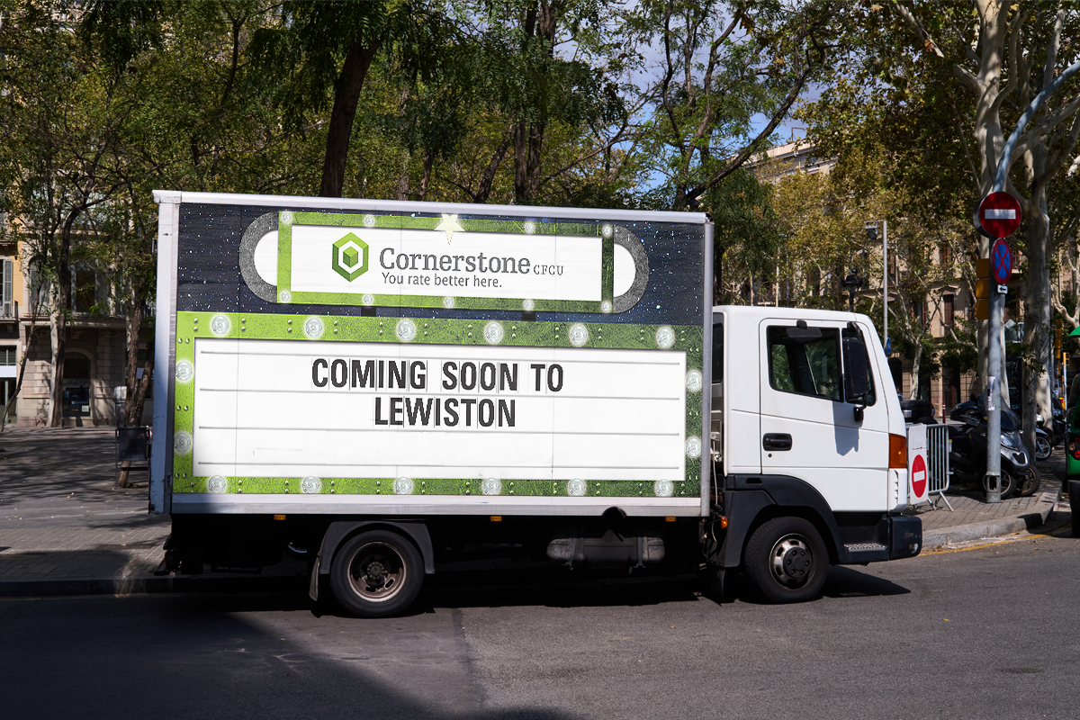 Mobile billboard truck promoting Cornerstone Community Federal Credit Union’s upcoming Lewiston branch opening.